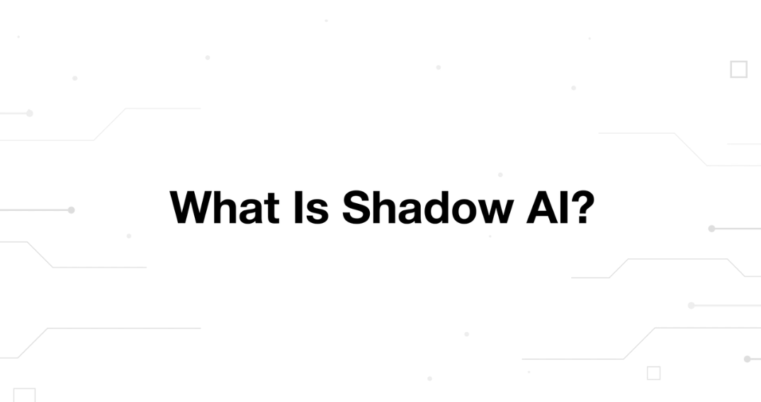 A minimalist presentation slide features a white background with faint, high-tech geometric patterns of lines and dots. Large, bold black text in the center reads 'What Is Shadow AI?'.